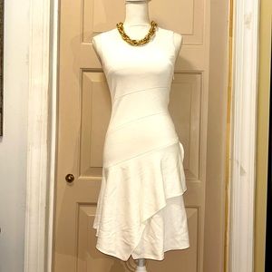RARE ALAIA SZ 38 ivory colored bodycon ribbed dress with midi length ruffle